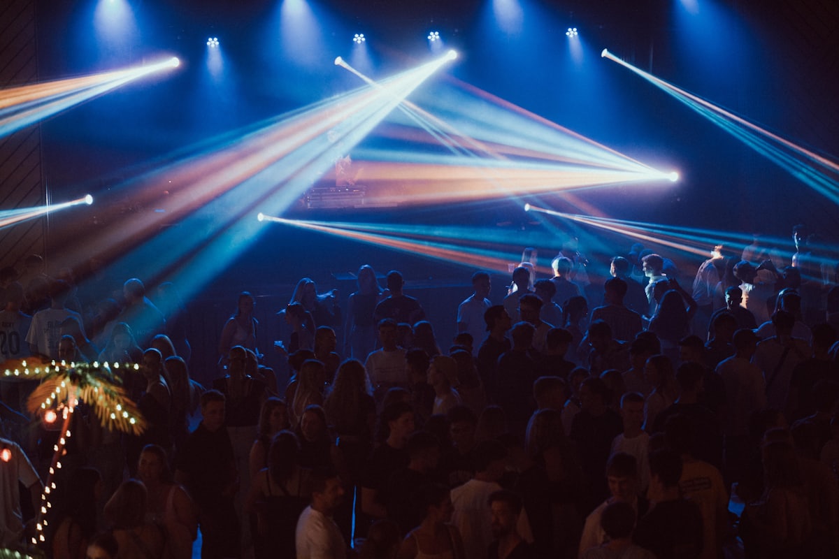 A dense crowd seen from the edge of a live event