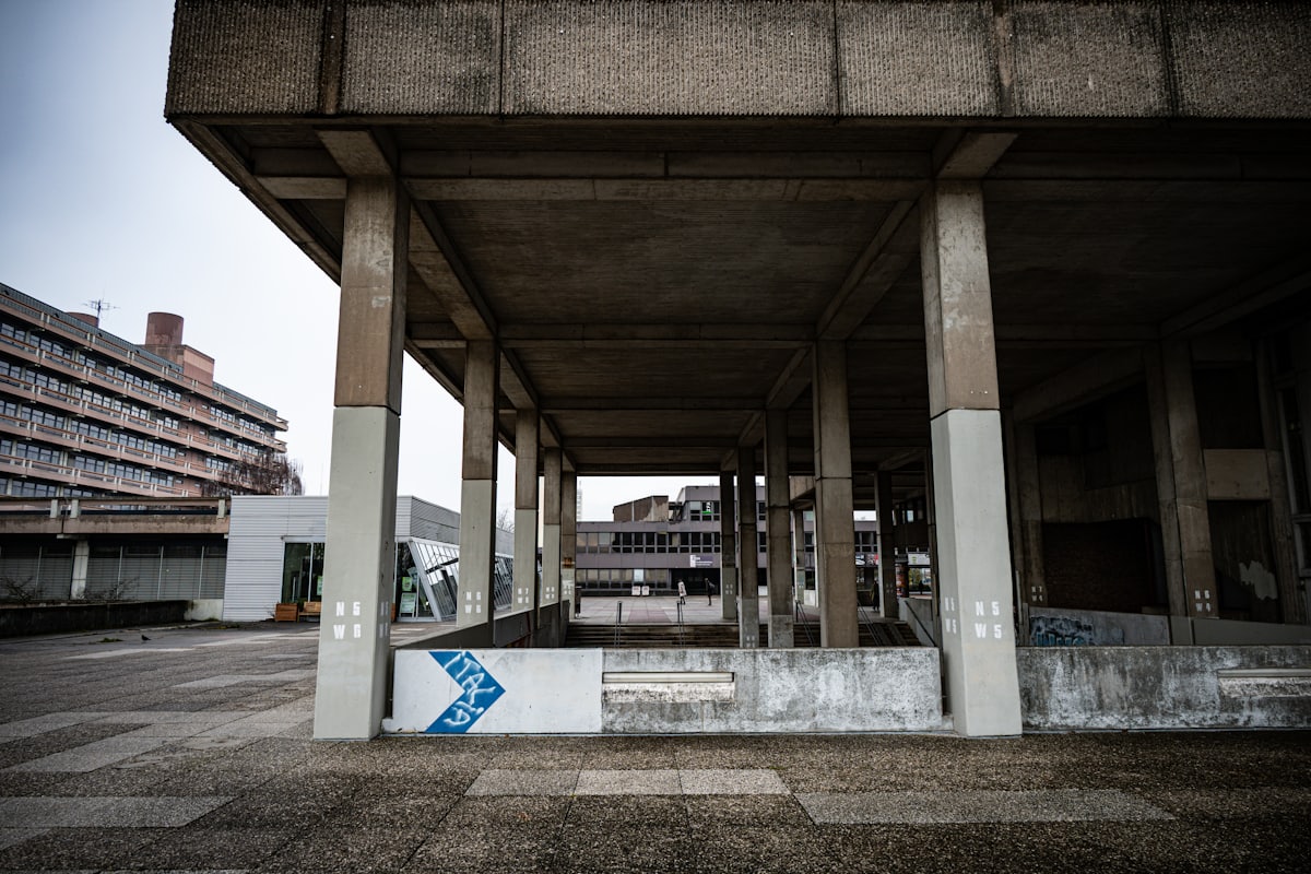 Tall structural columns in an open concrete hall